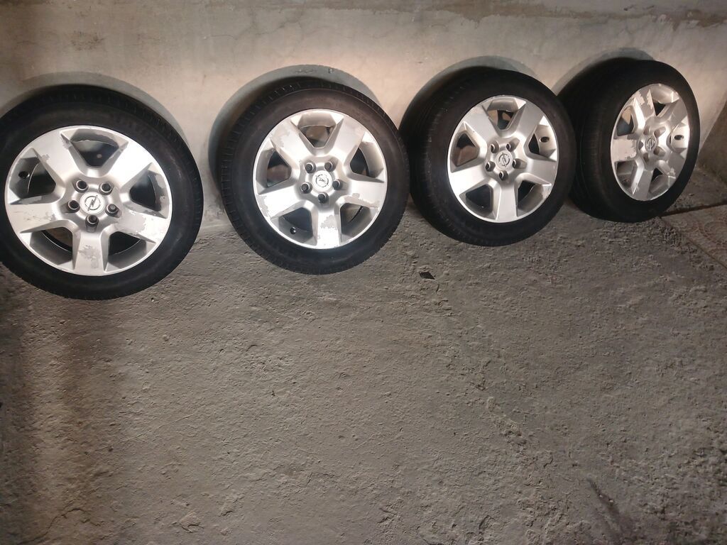 Opel original 5 kollu yüngül lehimli disklər və şin komplekti -