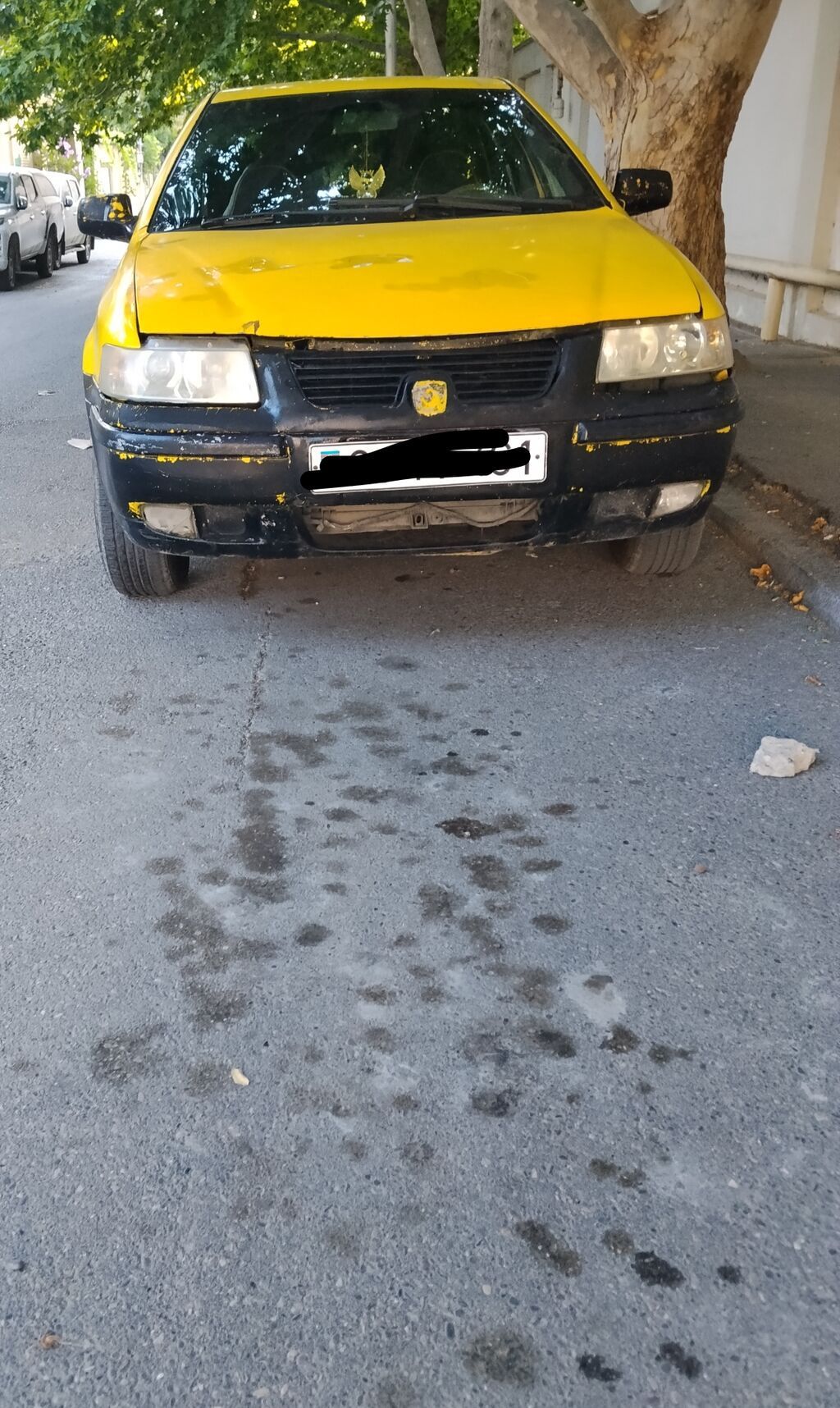 Model: Iran Khodro Samand (sedan) Kuzov: 4 qapı, sarı/qara rəng sxemi — Avtomobillər, Fatmayı