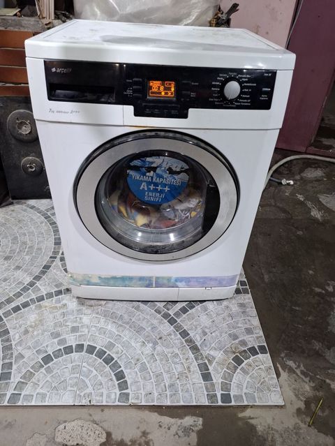 YALNIZ DURULAMA PROGRAMINDA IWLEYIR.Arçelik önyükləməli paltaryuyan