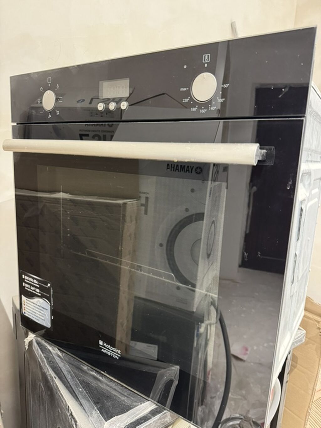 Hotpoint Ariston quraşdırılan elektrik sobası - Ön panel: qara şüşə — Mətbəx texnikası, Bakı (3)