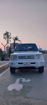 Mitsubishi Pajero io, 1.8 L, 1998 il, 409 039 km — Cars