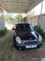 Lifan 320 kompakt hetçbek avtomobil. Tünd göy rəngli кузов, 5 qapılı — Avtomobillər