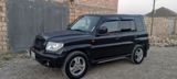 Mitsubishi Pajero io, 2000 il — Автомобили