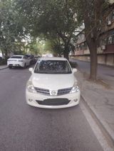 Nissan Tiida, 1.6 L, 2009 il, 316 000 km — Автомобили