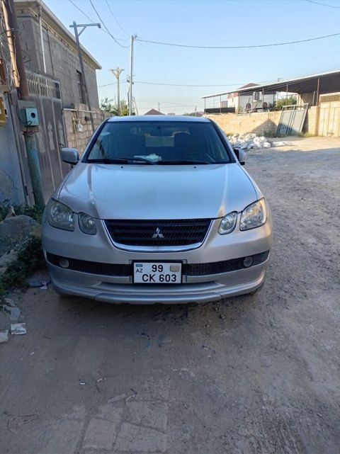 Mitsubishi Airtrek, gümüşü rəng, 5 qapılı krossover/SUV. Texniki və