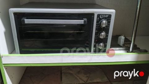 Ellay mini elektrik sobası. Şüşə qapılı kompakt sobadır, ön