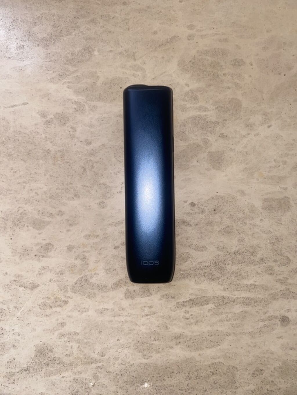 IQOS cihazı, tünd göy rəngdə korpusla təqdim olunur. Kompakt və zərif — Gözəllik və sağlamlıq, Bakı