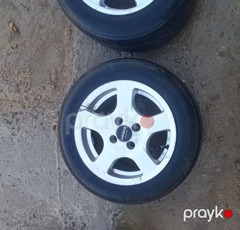 Avtomobil üçün 4 ədəd yüngül lehimli disk və üzərində şin dəsti
