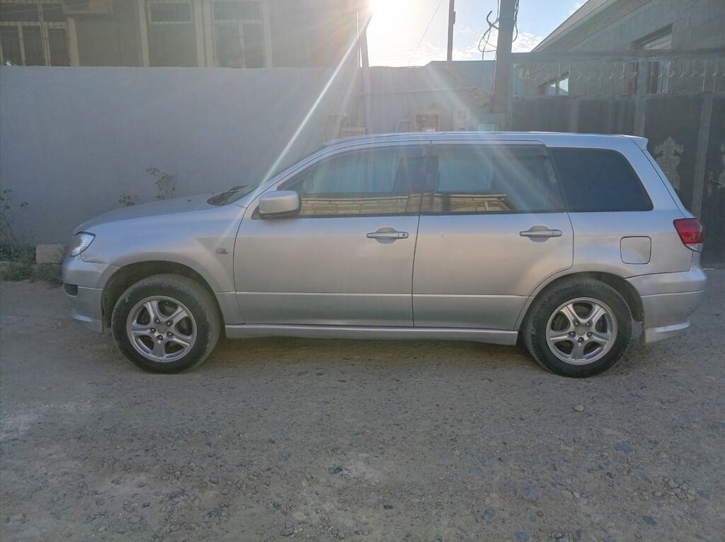 Mitsubishi Airtrek, gümüşü rəng, 5 qapılı krossover/SUV. Texniki və — Avto, Sumqayıt (2)