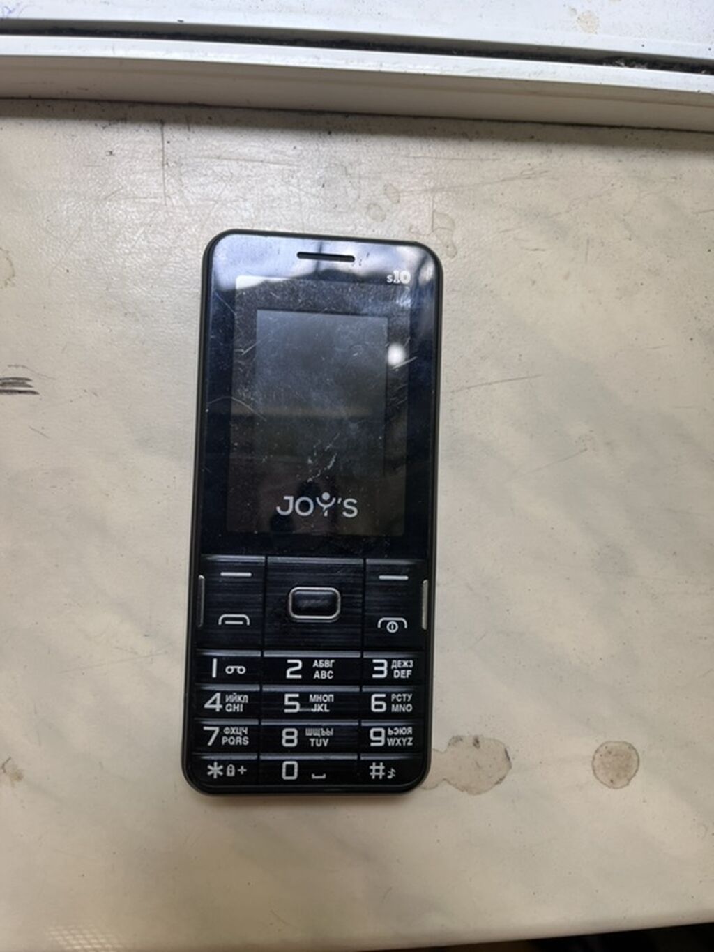 Bir paket köhnə mobil telefonlar - Sensorlu smartfon: qara rəng, ön — Elektronika, Xırdalan (2)