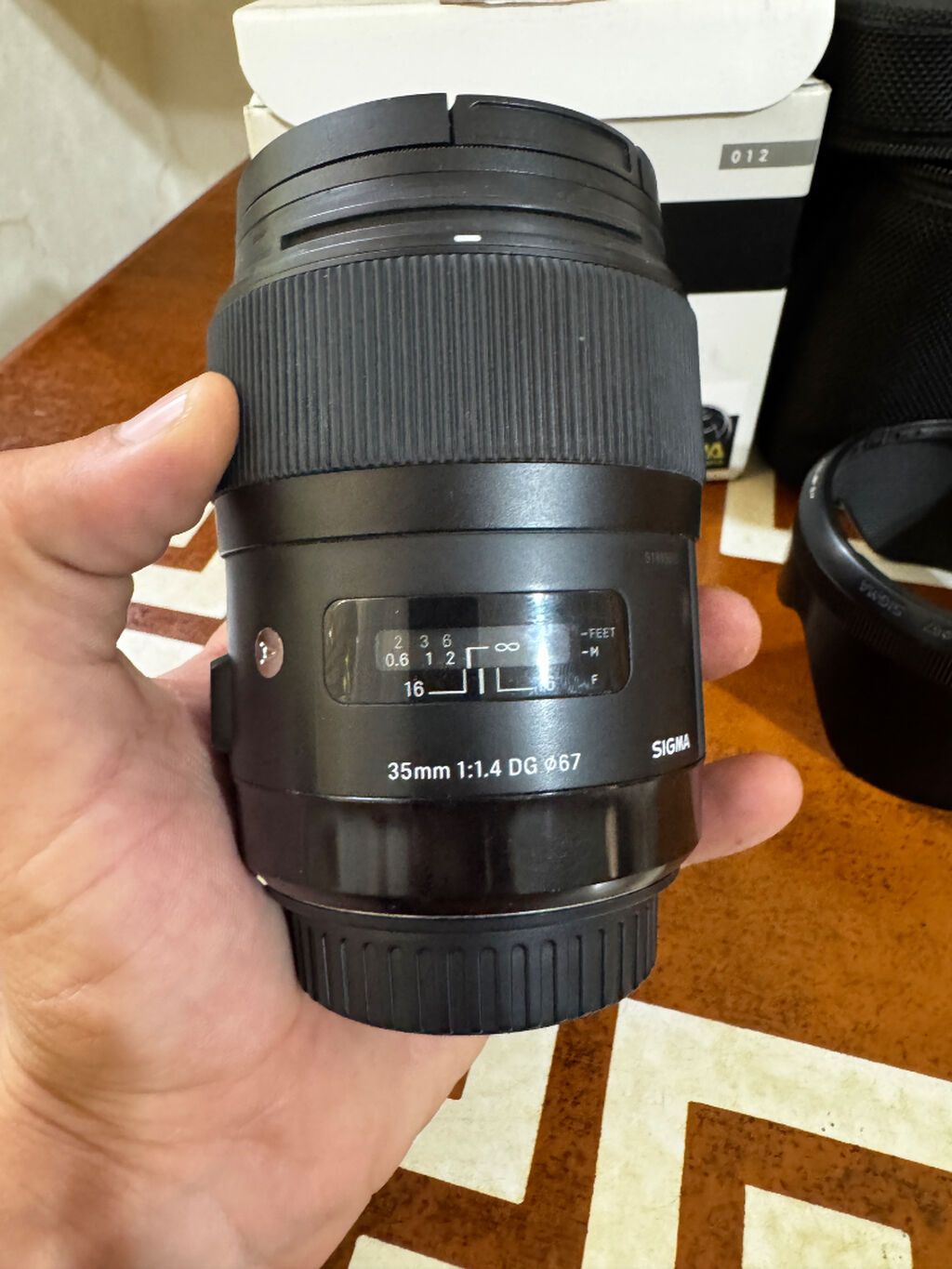 Sigma 35mm canon üçün əla vəzyətdə satılır.Qutusu çuxolu qoruyucu — Elektronika, Bakı