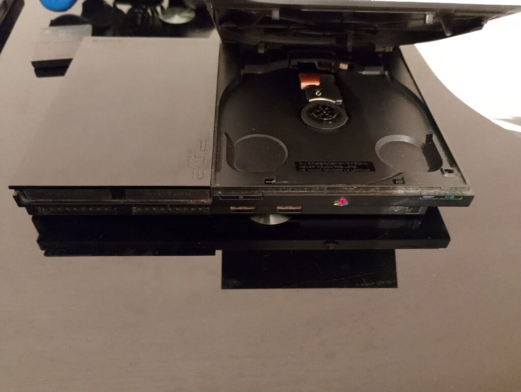 PlayStation 2 Slim konsol paketi Məzmun: - Sony PlayStation 2 Slim — Elektronika, Masazır (4)