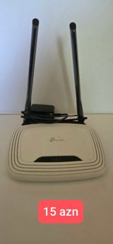 - TP-Link Wi‑Fi router – 2 antennali model. Ev və ofis üçün sabit — Elektronika