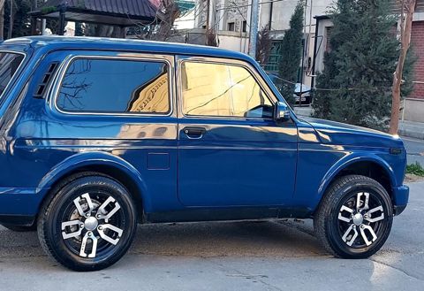 Niva diski satilir tekce barter olunur zavod disk yekeri + pul Lada — Bakı