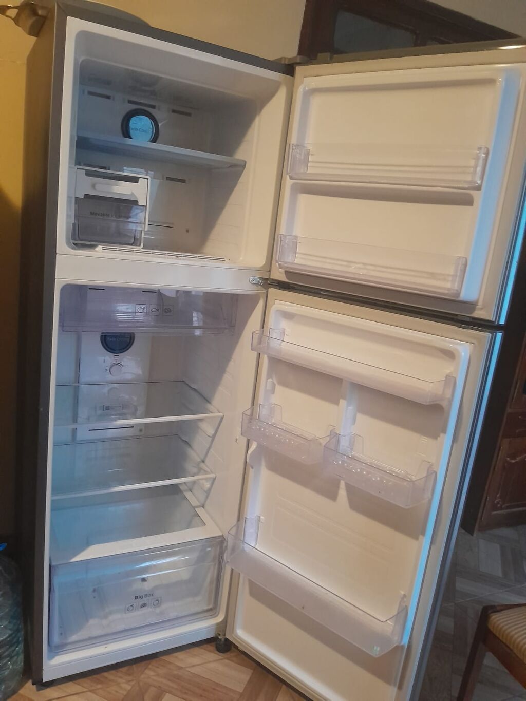 İki qapılı soyuducu (üstdə dondurucu, altda soyuducu), metalik rəng — Soyuducular, Gəncə (2)