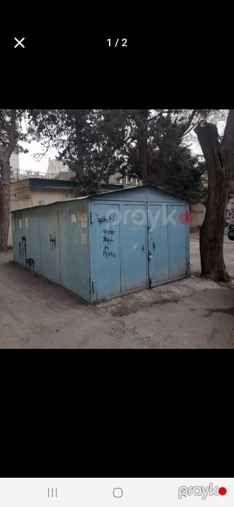 28 mayda,merkezi bankin yanindaki binanin heyetinde qaraj icareye