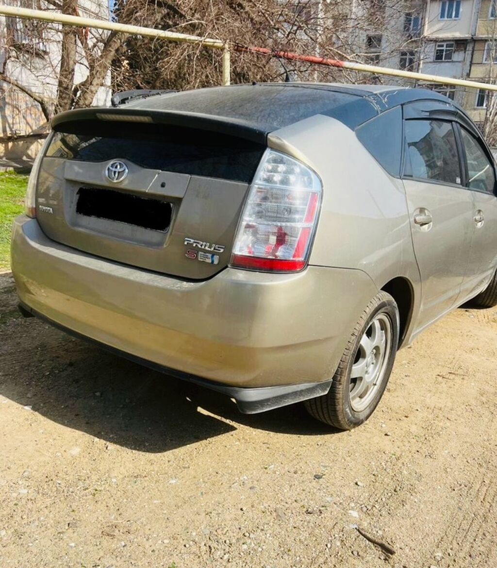 Toyota Prius (2-ci nəsil) hibrid hetçbek Xarici görünüş: - Qızılı/boz — Avto, Masazır (4)