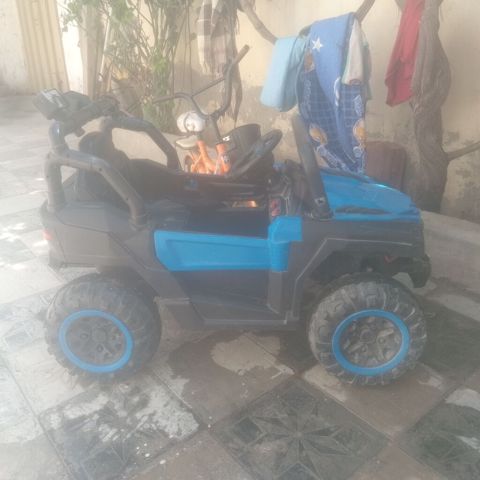 Uşaq üçün elektrikli off-road maşın - Korpus: mavi-qara rəng — Digah