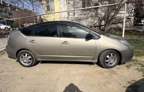 Toyota Prius (2-ci nəsil) hibrid hetçbek Xarici görünüş: - Qızılı/boz — Masazır