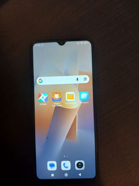Redmi smartfon - Model: Redmi (mavi arxa qapaq, arxa paneldə barmaq — İmişli