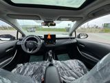 Toyota Corolla sedan – ağ rəng, hibrid. Texnologiya və avadanlıq — Cars