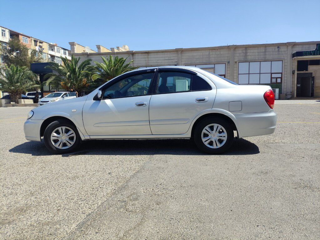 Nissan Sunny, 1.3 L, 2009 il, 300 525 km — Avtomobillər, Bakı (9)
