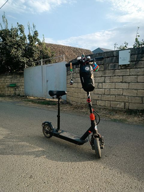 Elektrik skuter – oturacaqli sürət-maks 35 məsafə-25-30 skuterin — Masallı