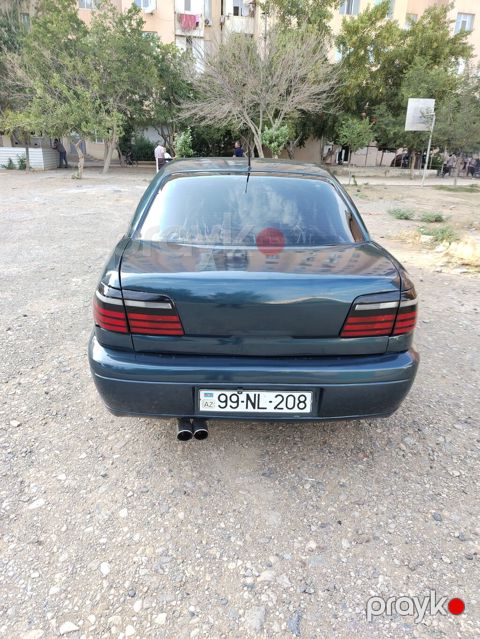 Opel Omega B sedan - Kuzov: 4 qapılı sedan, tünd yaşıl rəng