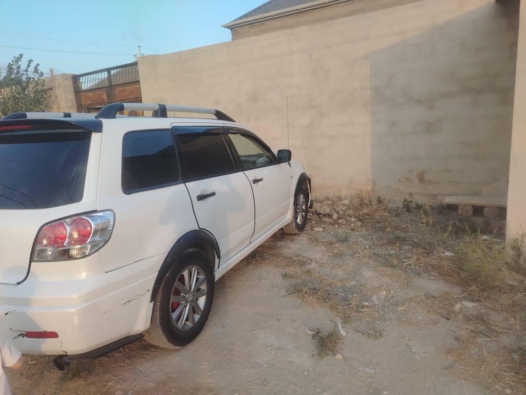 Mitsubishi Outlander, ağ rəng, 5 qapılı krossover/SUV. Xarici: - Ağ — Avto, Bakı (2)