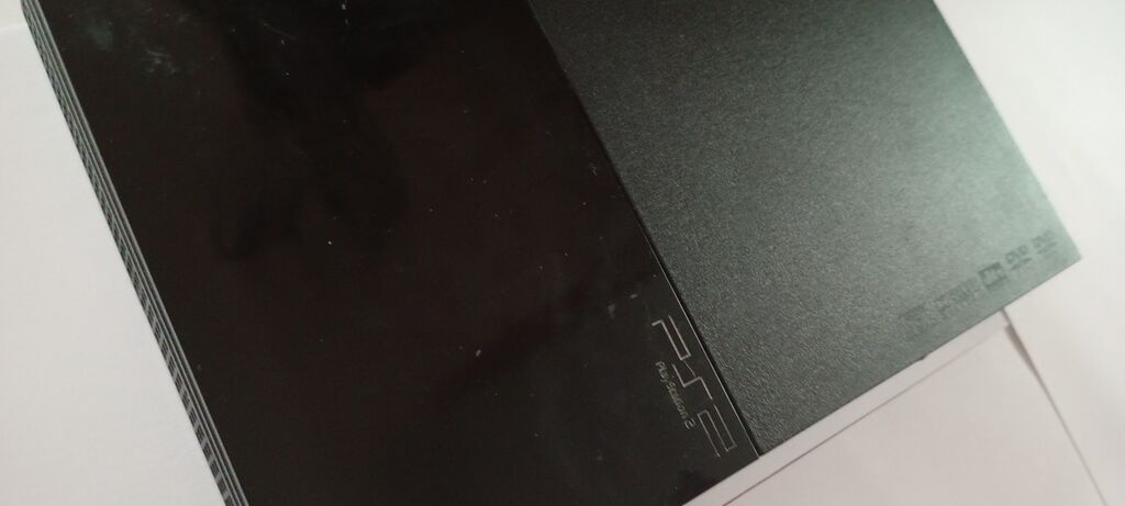 Sony PlayStation 2 Slim (PS2) oyun konsolu üstündə iki işlək pult 17 — Elektronika, Bakı (4)