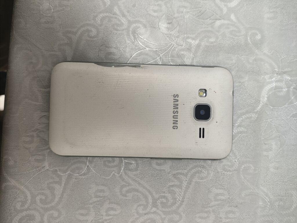 Samsung Galaxy J1, rəng - Ağ, İki sim kartlı — Samsung, Bərdə