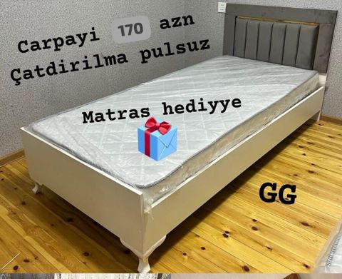 Ağ rəngdə tək nəfərlik çarpayı. - Yumşaq, dikdörtəbə başlıq hissəsi — Mehdiabad