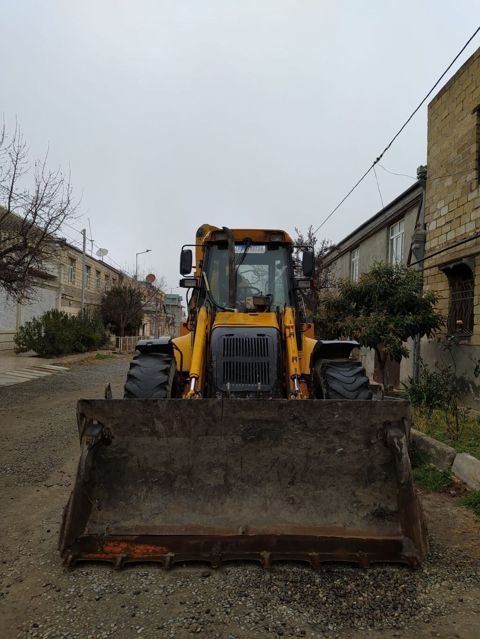 MST ekskavator-yükləyici (backhoe loader) - Marka/model: MST M5 — Gəncə