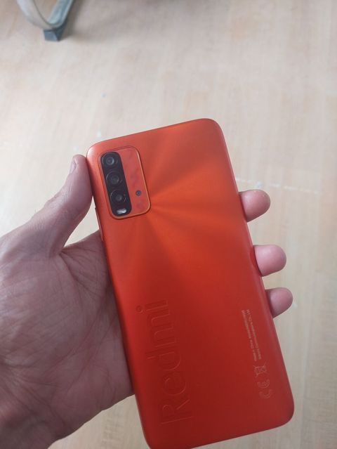 Xiaomi Redmi (narıncı rəng) smartfon - Korpus: Mat narıncı arxa — Xırdalan