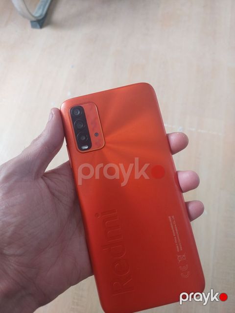 Xiaomi Redmi (narıncı rəng) smartfon - Korpus: Mat narıncı arxa