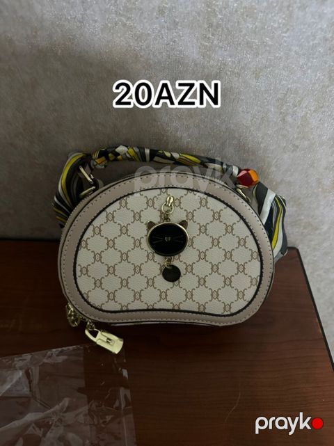 Qadın çantası – 20 AZN - Forma: yarımdairə/oval - Rəng: bej tonu — Masazır