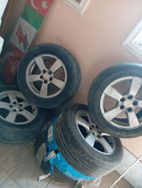 Chevrolet orijinal yüngül lehimli disklər və təkər dəsti - Komplekt — Gəncə