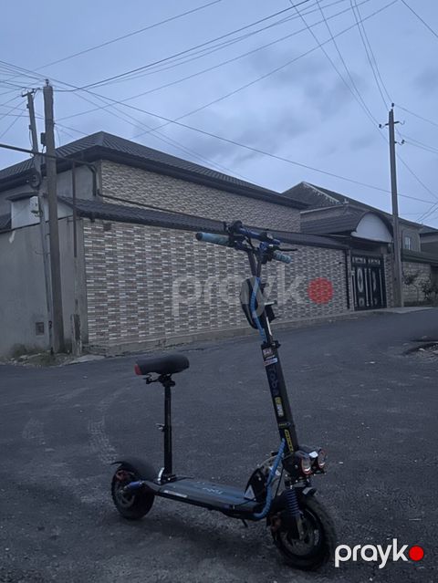 Elektrik skuter – off-road təkərlər və güclü işıqlanma ilə saata 60 km — Xaçmaz