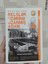 Relslər üzərinə uzanmış adam – psixoloji roman Müəllif: Rövsən — orxan quliyev — Kitablar