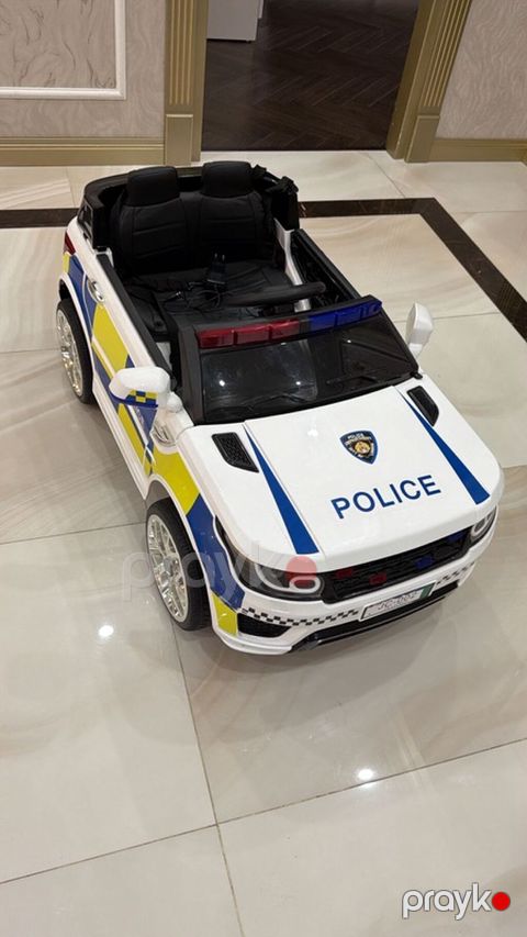 Uşaq üçün elektrikli polis maşını - Dizayn: Ağ rəngli kuzov — Bakı