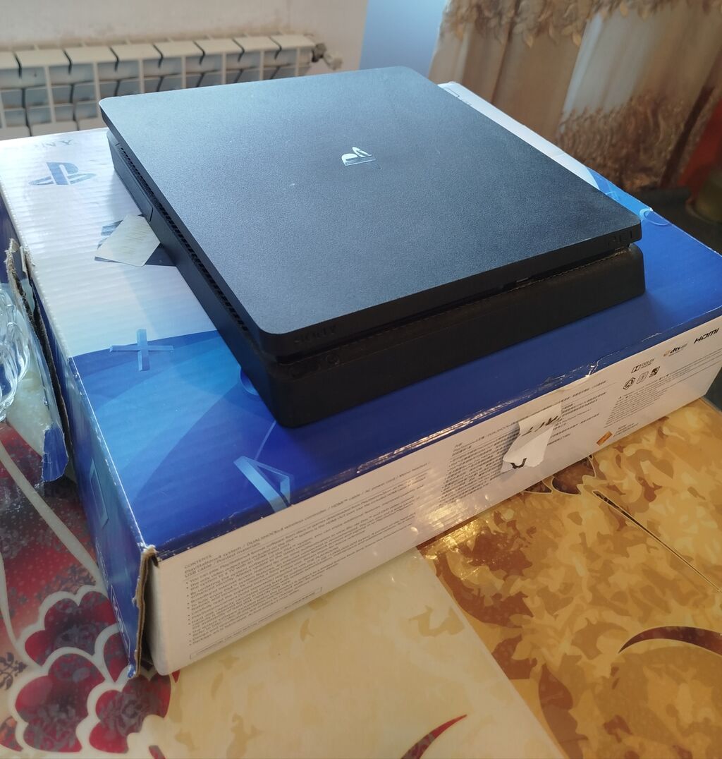 Sony PlayStation 4 Slim oyun konsolu Xüsusiyyətlər: - Rəng: qara — Oyun konsolları, Bakı