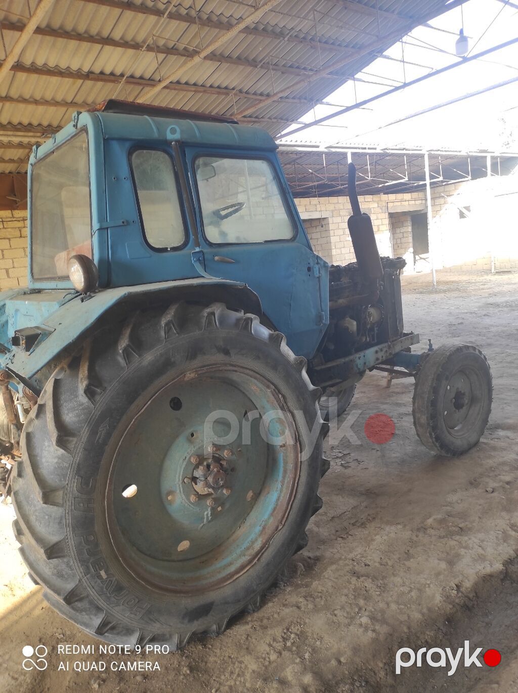 Mavi rəngli təkərli kənd təsərrüfatı traktoru - Kabinalı, iki qapılı — Traktorlar, Şirvan (3)