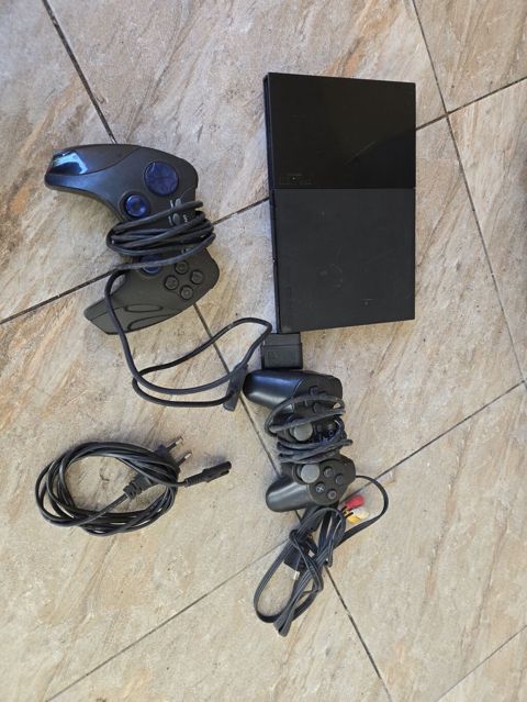 Diski oxumur qalan her weyu iwleyir.Sony PlayStation 2 Slim (Model — Oğuz