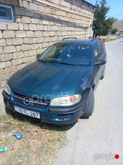 Opel Omega: 2 l 1996 il Universal — Masazır