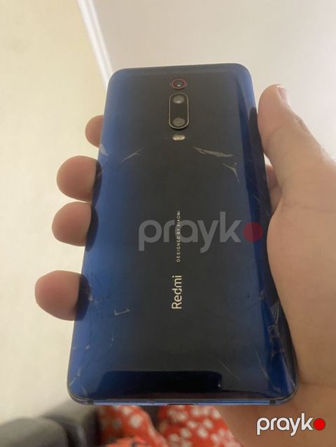 Xiaomi Redmi (arxa hissədə “Redmi – Designed by Xiaomi” yazılı, mavi — Sumqayıt
