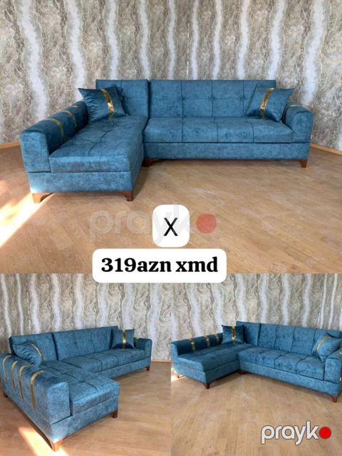 Künc divan – mavi rəng, yumşaq toxumalı parça. L‑şəkilli dizayn — Bakı