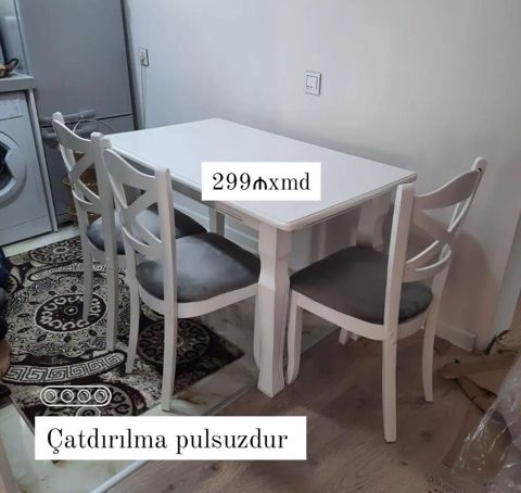 Ağ rəngdə yemək masası və 4 ədəd stul dəsti. Xüsusiyyətlər: - Kompakt — Bakı