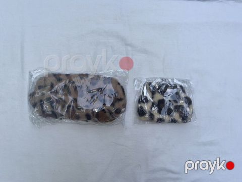 Yeni tiqrovu pulqabı və tiqrovu kosmetika çantası. Hər ikisi yenidir