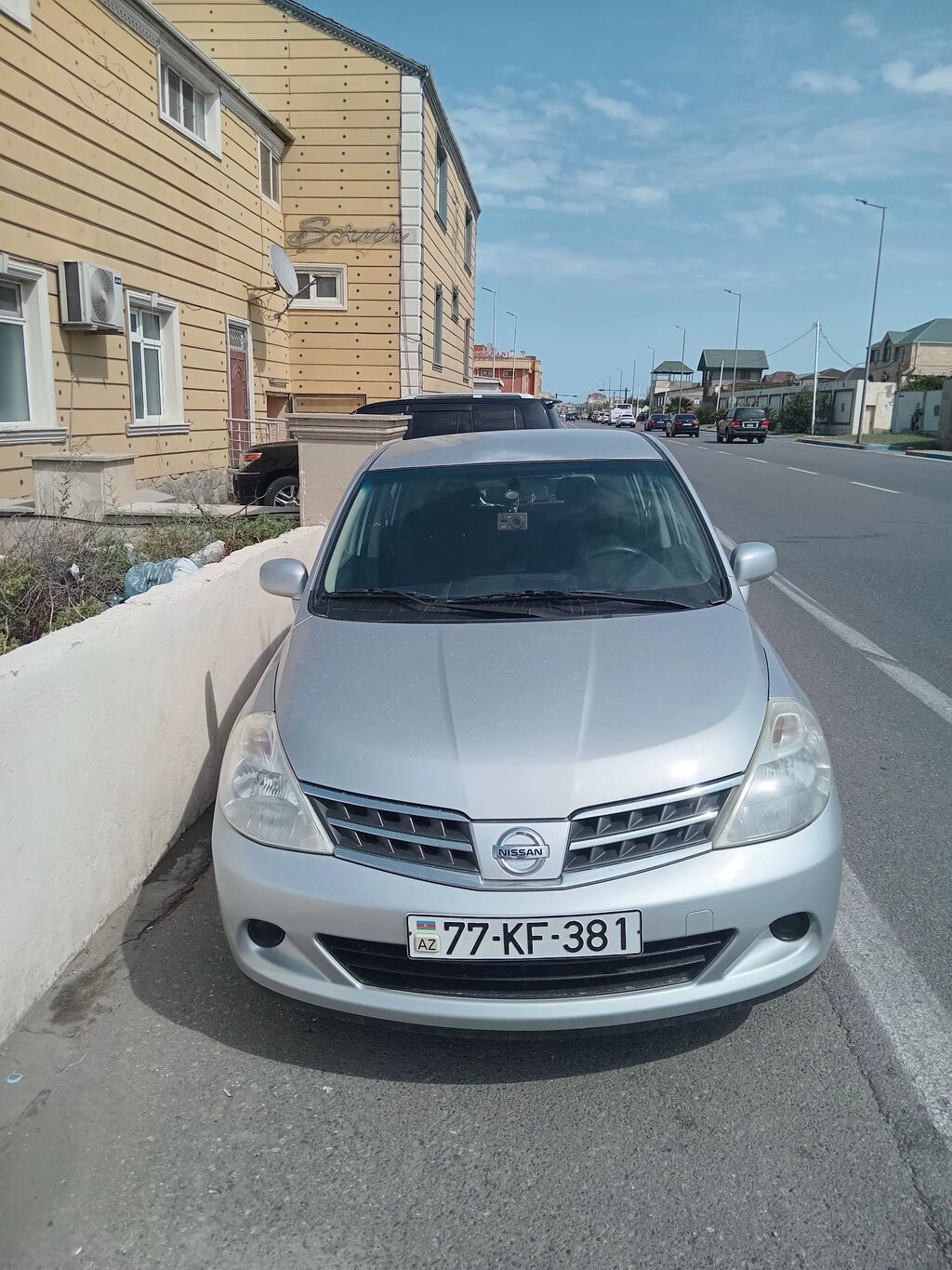 Nissan Tiida, gümüşü rəng, hatchback kuzov. Əsas xüsusiyyətlər — Avtomobillər, Beyləqan (3)