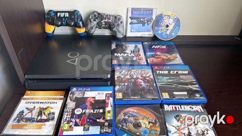 PlayStation 4slim heç bir problemi yoxdu,disklerle bir yerde — Bakı